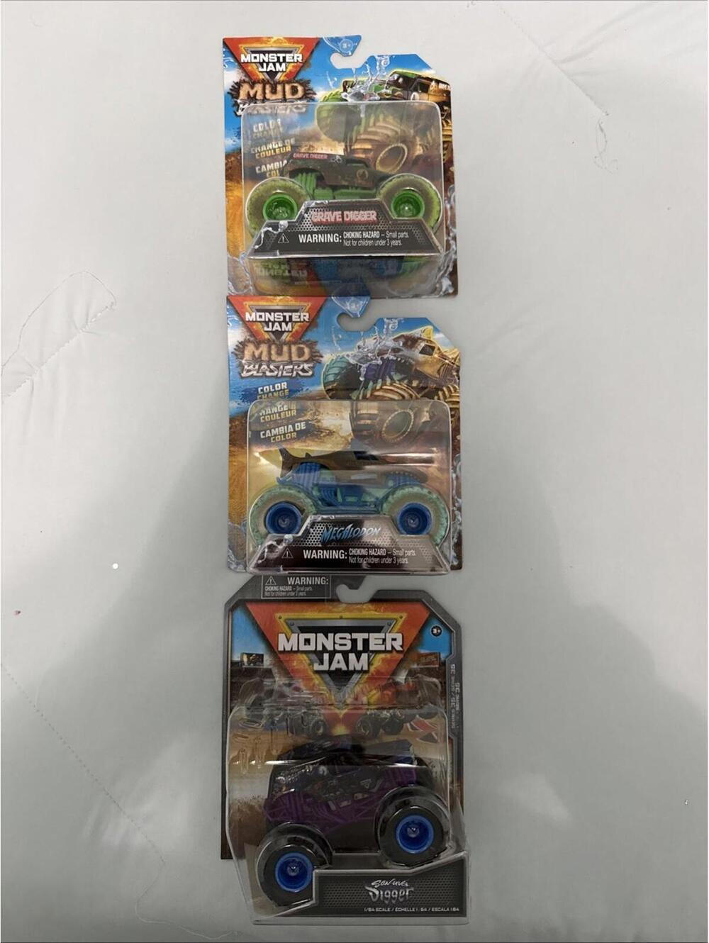 Lot of 3 2025 Spin Master Monster Jam Mud Blasters Megalodon Grave Digger & Son